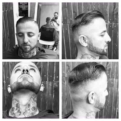 Skin fade combover with a razor shave beard line up