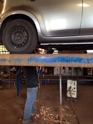 Our car getting welded.