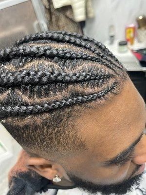 Man stitch braids + unique parts