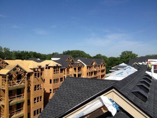 We topped off this apartment building with black asphalt shingles.