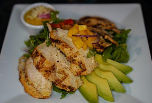 Try our whole grilled boneless chicken breast with mango salsa and avocado