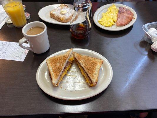 Egg Sandwich with Sausage and Cheese, French toast, scrambled eggs, and ham