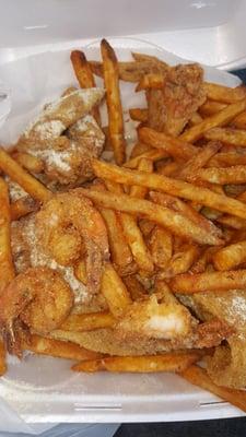 Fish, shrimp and chicken wings with fries