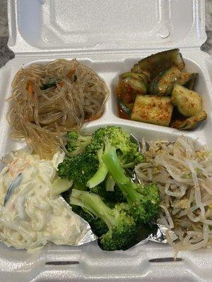 Sides (banchan). Comes with the meal. Clockwise: japchae, cucumber kimchi, mung bean salad, broccoli, creamy white seaweed salad.