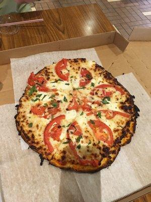 Tomato basil mozzarella pizza