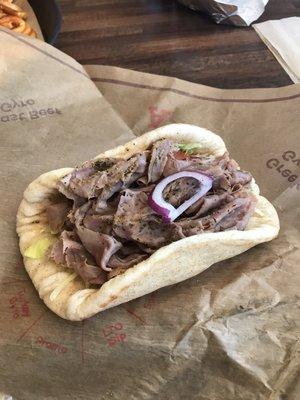 Roast beef gyro delish wish there's more veg