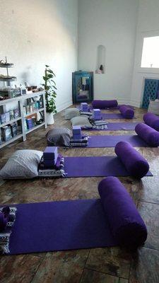 Melt into deep supported comfort with group restorative yoga classes Tuesdays 7pm & Saturdays 11 am.