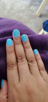 Dip powder blue nails super cute other than the cracks.