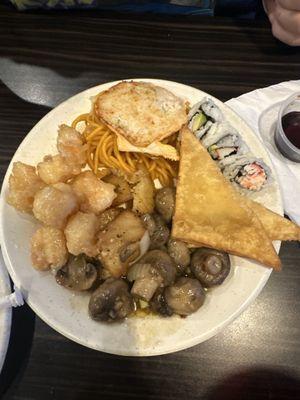 Mushrooms, crab rangoons, amazing potatoes, and sushi