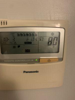 Thermostat showing it's 80° in the room