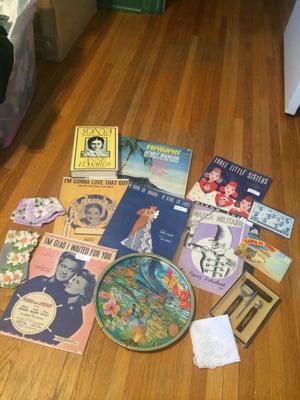 2 Postcards-$5, Hawaii metal tray-$8, Hawaii record-$2.50, bar set-$3.50, book-$2.50, 5 sheet music-$10, 3 hankies-$7.50. :)