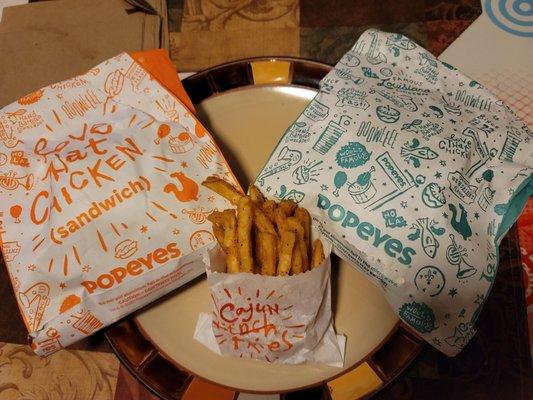 Spicy Chicken Sandwich, Cajun Flounder Sandwich and fries.