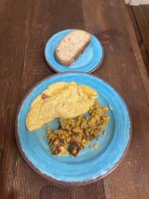 Ham and Cheese Omelet, side of sour dough bread, side of warmed brussel sprout hash