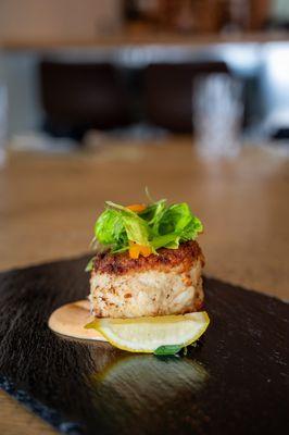 Crab Cake with Calabrian chili aioli, fresh herb salad, lemon