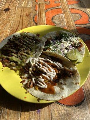 The Bandito Taco, taco of the month (chicken tinga) and Cajun Chicken Taco