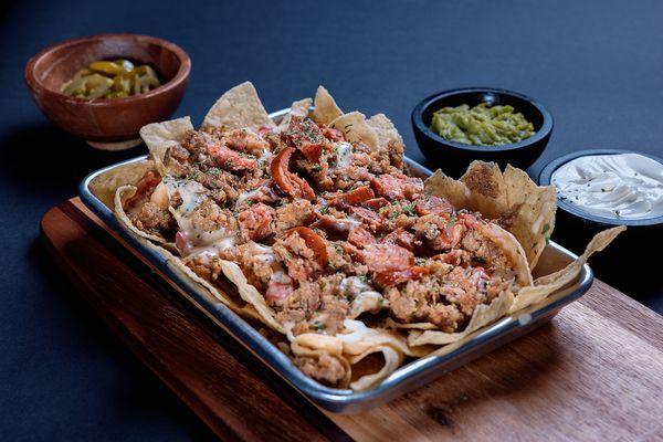 ULTIMATE NACHO WITH BOUDIN AND PEPPERJACK SAUSAGE