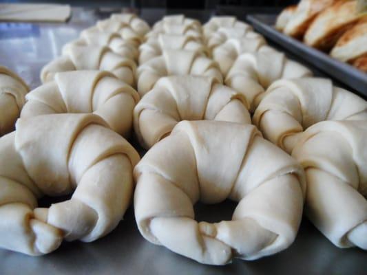 Fresh hand rolled plain croissants