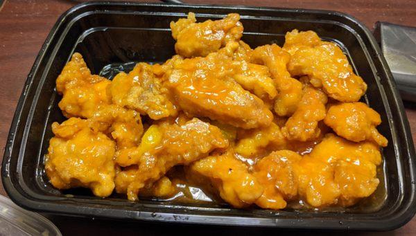 Orange chicken. Very different from your usual orange chicken. No vinegar or tang to it.