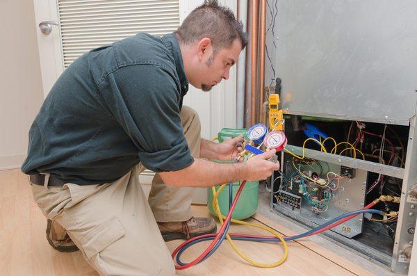 Charging a heat pump with refrigerant.