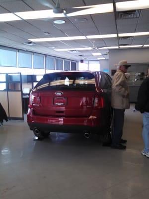 Show room at Skalnek Ford dealership.