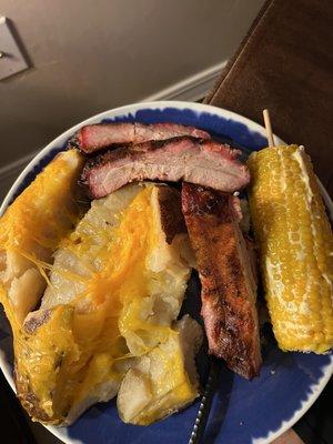 Jumbo Smoked Potat, ribs and corn.