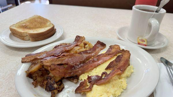 2 Scrambled Eggs, White Toast, Bacon Extra Crispy and Home Fries.