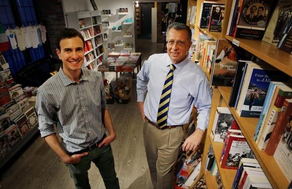 I AM Books co-owners Nicola Orichuia and Jim Pinzino (photo courtesy Boston Globe Magazine)