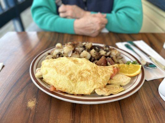 Heart of artichoke omelette with kitchen fries