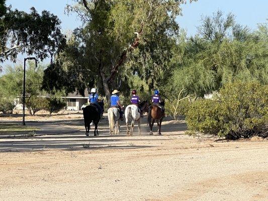 Trail riding class leaving for a trail ride