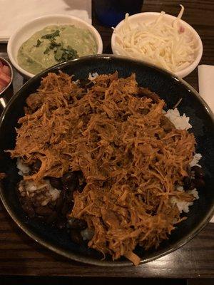 Casualas Rice and Bean Bowl with Pork Cochinita. Toppings on the side. Very good!