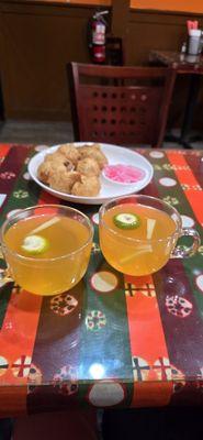 Lemon tea and beef momos