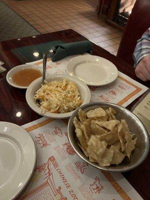 The crispy wonton chips and slaw delivered before your meal; really unique and both great!