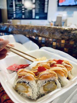 Salmon Roll with crab, tempura shrimp & fresh salmon!