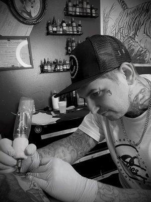 Owner Tim ink or swim tattooing