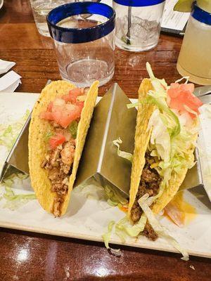 Mahi mahi taco on left. Carnita taco on right. Asked for hard shell