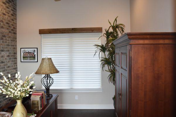 Study Room featuring Hunter Douglas Alustra Silhouette Shade in closed position for more privacy day and night.