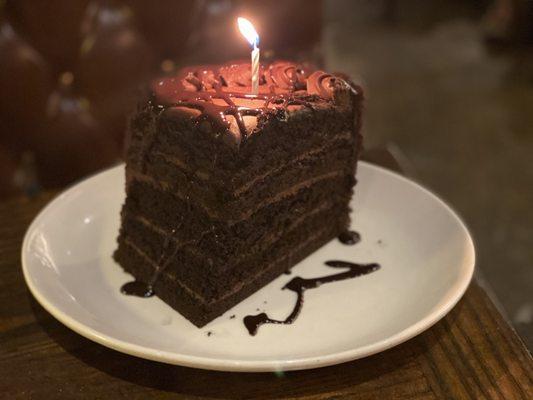 Colossal Chocolate Cake. Very good, and rich. I could only finish almost half. The cake is 50% off for birthdays. It could serve 3-4 people.