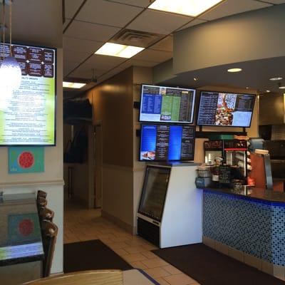 Come in and check out our digital menu boards  under our pizza slice shaped ceiling over our front counters.