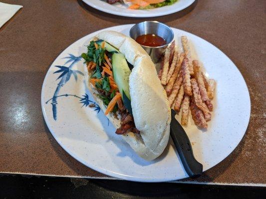 54. Banh Mi Thit Nuong (charbroiled marinated pork) w/taro fries