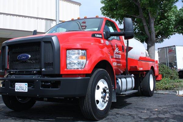 Portable restroom service trucks.