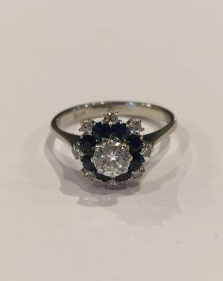 18k white gold blue sapphire and diamond solitaire