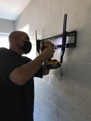 Sean working on the TV mount