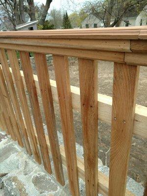 Custom routered cedar fence with cap and facia