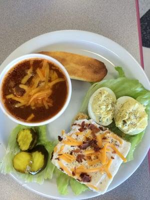 Today's special cornbread salad, chili, deviled egg, cornbread