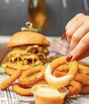 Dipped, stacked, and utterly irresistible--our onion rings are a must-try at Burger and Philly!