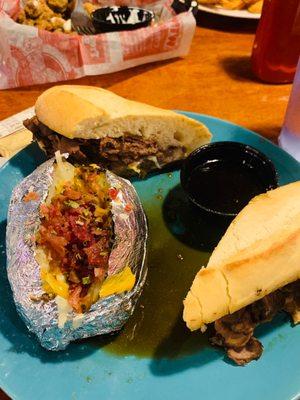 Prime Rib Sandwich with loaded baked potato