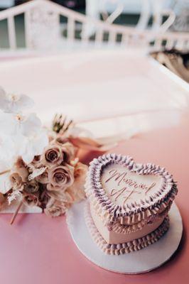 The most delicious wedding cake ever! Strawberry shortcake with passionfruit curd, layered between coconut mango cream.