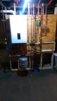 Navien on-demand heating and hot water system