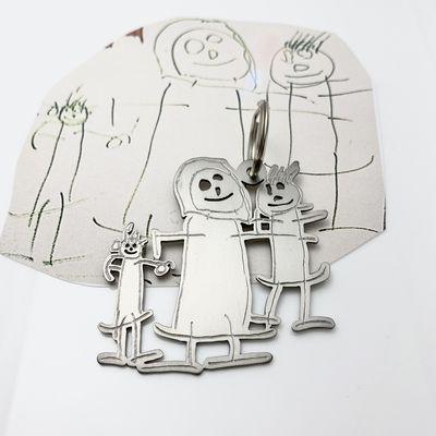 Family keepsake, kids drawing cut out by hand in titanium for a keychain!!