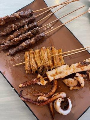 Beef; tofu skin &enoki mushrooms; squid